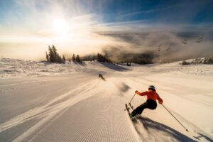 Sun peaks skier sunset